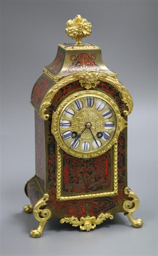 A gilt mounted French boullework mantel clock 31cm high,16cm wide